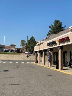 Storefront as seen from the southeast end of parking lot