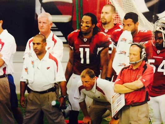 Dr. Maynard is the chiropractor for the Arizona Cardinals. Here he is with the Larry Fitzgerald on the Cardinals sideline