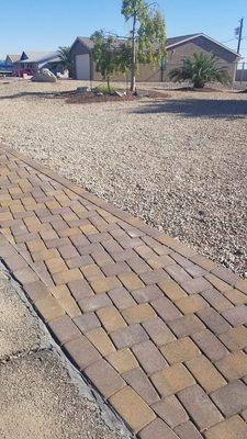 A great paver job and colored gravel planter. I'm very pleased with the service and final results.