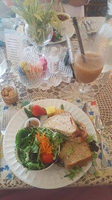 My delicious fruity turkey sandwich with a side salad and what's left of my iced spicy chai tea. Yummy!