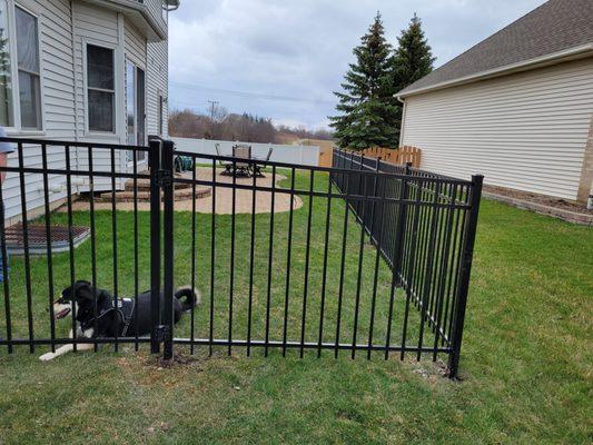 Outside view of 4' Black Aluminum with PVC in background