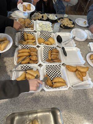 Take-out order, with nothing marked so could not identify what was inside the empanadas and pastelitos by looking