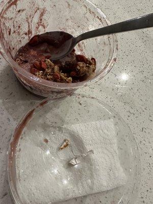 Açaí bowl with plastic remnants