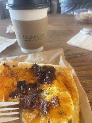 Bacon, cheddar, egg breakfast pastry and caramel macchiato