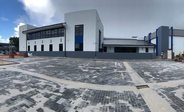 As you're standing outside facing this , the School bldg is on left and new church lobby is in the middle and church sanctuary on right .