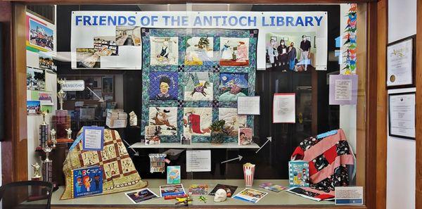 Display case celebrating the Friends of the Antioch Library