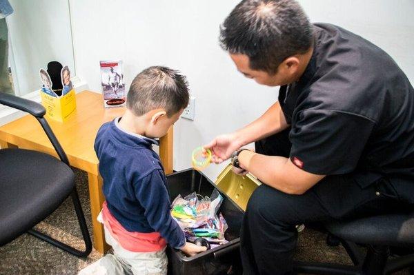 Kids get to pick a fun toy from the Treasure Chest after their eye exam!