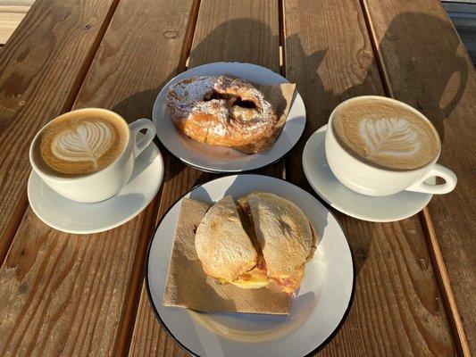 Cafe latte, danish (blackberry) pastry and the breakfast ham sandwich.