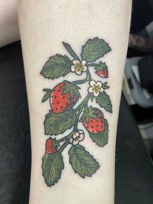 Strawberry floral tattoo done by our tattoo apprentice Cameron Plouff