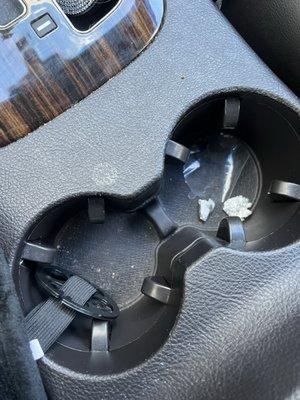 Trash left in cup holders, not wiped out