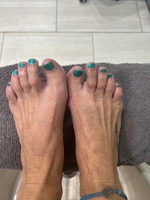 Beautiful teal pedicure by Sang.