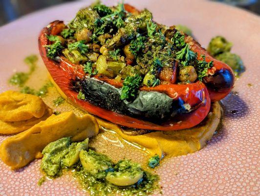 The chef offered to make a custom vegan dish: roasted red pepper stuffed with vegetables, pine nuts, and chickpeas atop a carrot puree.