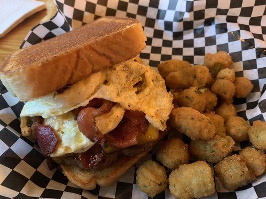 Eggcelent burger with side of okra. The fried egg was new to me on a burger, but it was delicious! Generous portions!