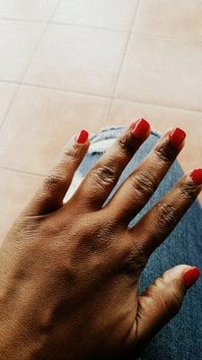 Acrylic nails, red polish:-)