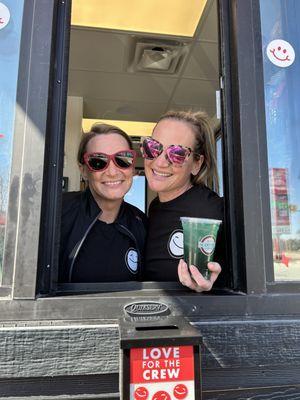 Amazing Store Manager, Angie, and the Owner, Shaina, holding a Blue Raspberry Scooot Energy Infusion.