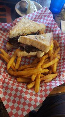 The Ray burger: bacon, mushrooms, ham, American cheese, and BBQ sauce on Texas toast