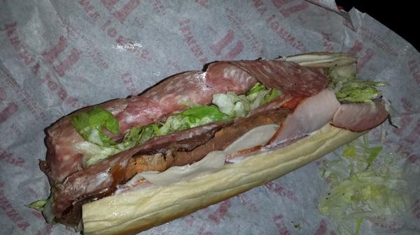 Gargantuan (- tomato,-onion). Genoa Salami, Capicola, smoked ham, roast beef, turkey, provolone, mayo, lettuce, Italian dressing