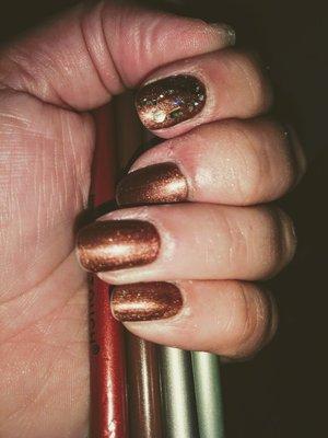 Manicure with No-chip: Leather Sachel by CND with Wizard of Oz glitter on forefinger