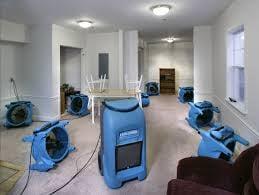 Drying out a flooded home.