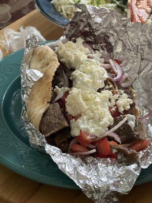 Gyro with Feta cheese on it.