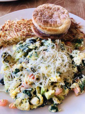 Spinach Avocado black olives tomato's and cheese with toast muffin and hash brown