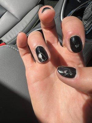 Chipped black nails