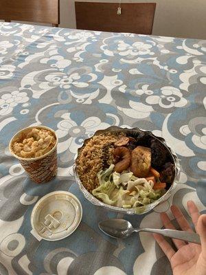 Jerk chicken and rice with a side of mac & cheese