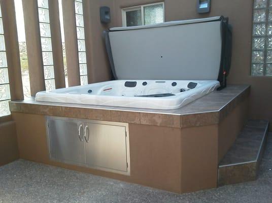 Indoor/outdoor spa installation for a client.