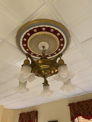 Ornate ceiling light in room