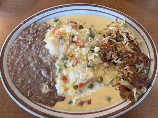 "Huevos Rancheros" in watery Velveeta Onion Sauce