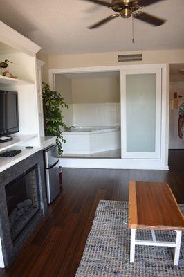 Living room area and jacuzzi tub