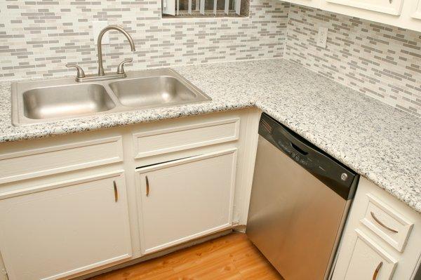 Kitchen with Granite Countertop and Stainless Steel Appliances