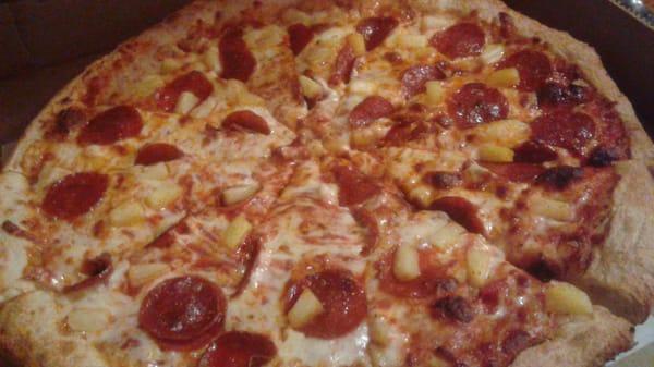 Yummy  pepperoni  and pineapple  pizza