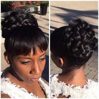 With prom and wedding season approaching we were elated to get this shot of a braided updo...elegance!