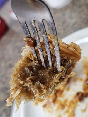 A fork with a piece of Baklava.