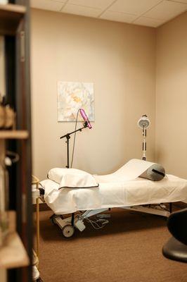 Treatment room #2. All treatment rooms have ADA compliant electric massage tables.  Far infrared crystal and other therapies available.