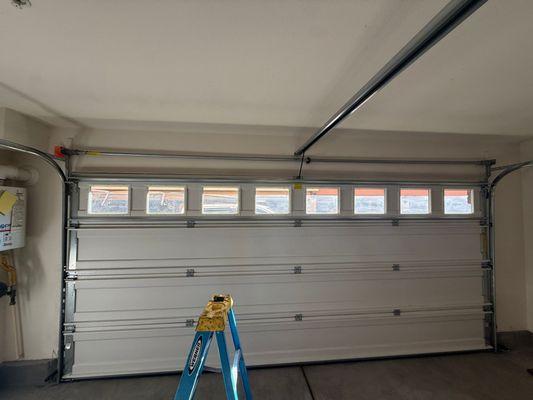 Before Garage Door Conversion to Torsion Springs in Chula Vista 91915