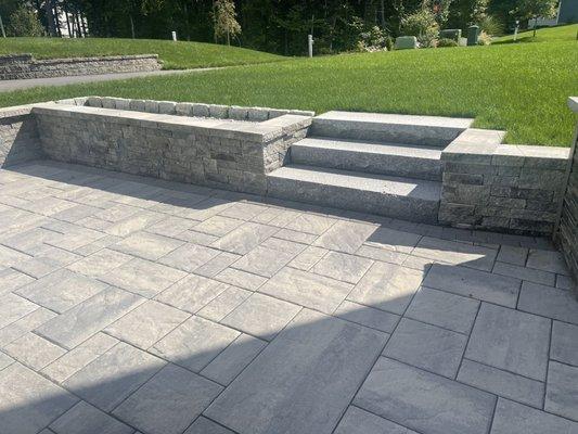 Granite stairs with patio and retaining wall