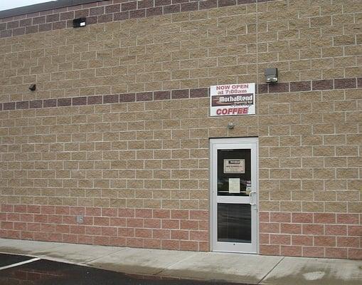 Back entrance with ample parking and easy access from Price Chopper.