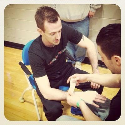 Getting my hands wrapped before a kickboxing match