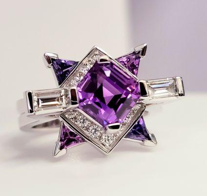 Amazing purple sapphire with triangle sapphire & diamond accents.