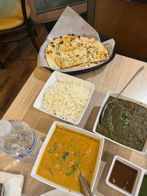 Garlic Nan, rice, vegetable korma, and lamb saag