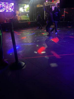 View of the dance floor and the DM booth from the "VIP" area.