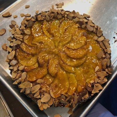 Apple tarte with a thin layer of raspberry jam and frangipane