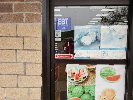 This is the entrance showing all of the credit cards they accept.