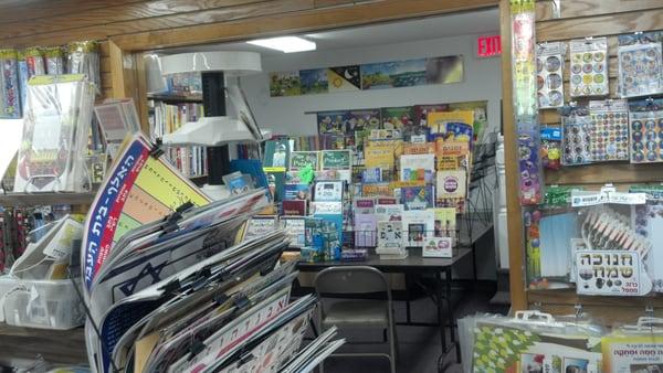 The basement has seforim (Hebrew-only books), and the Hebrew School section (English/Hebrew books, posters, stickers, etc. )