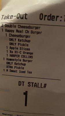 Receipt CLEARLY reads only ketchup and extra pickle on the Homestyle burger.