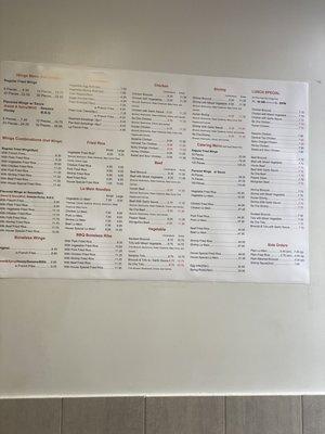 Updated menu on wall of restaurant as of 9/1/2021