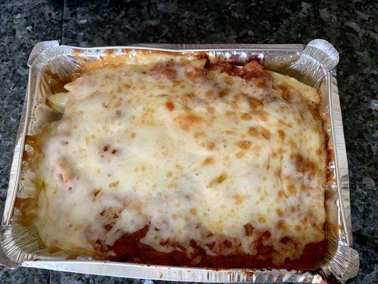 Pasta with sauce an baked with melted cheese