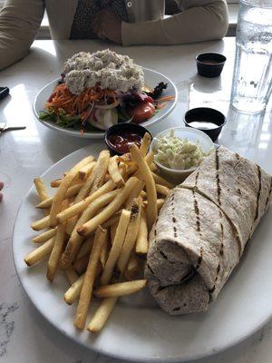 Lunch $10 - flounder wrap and tuna garden salad really nice portions.